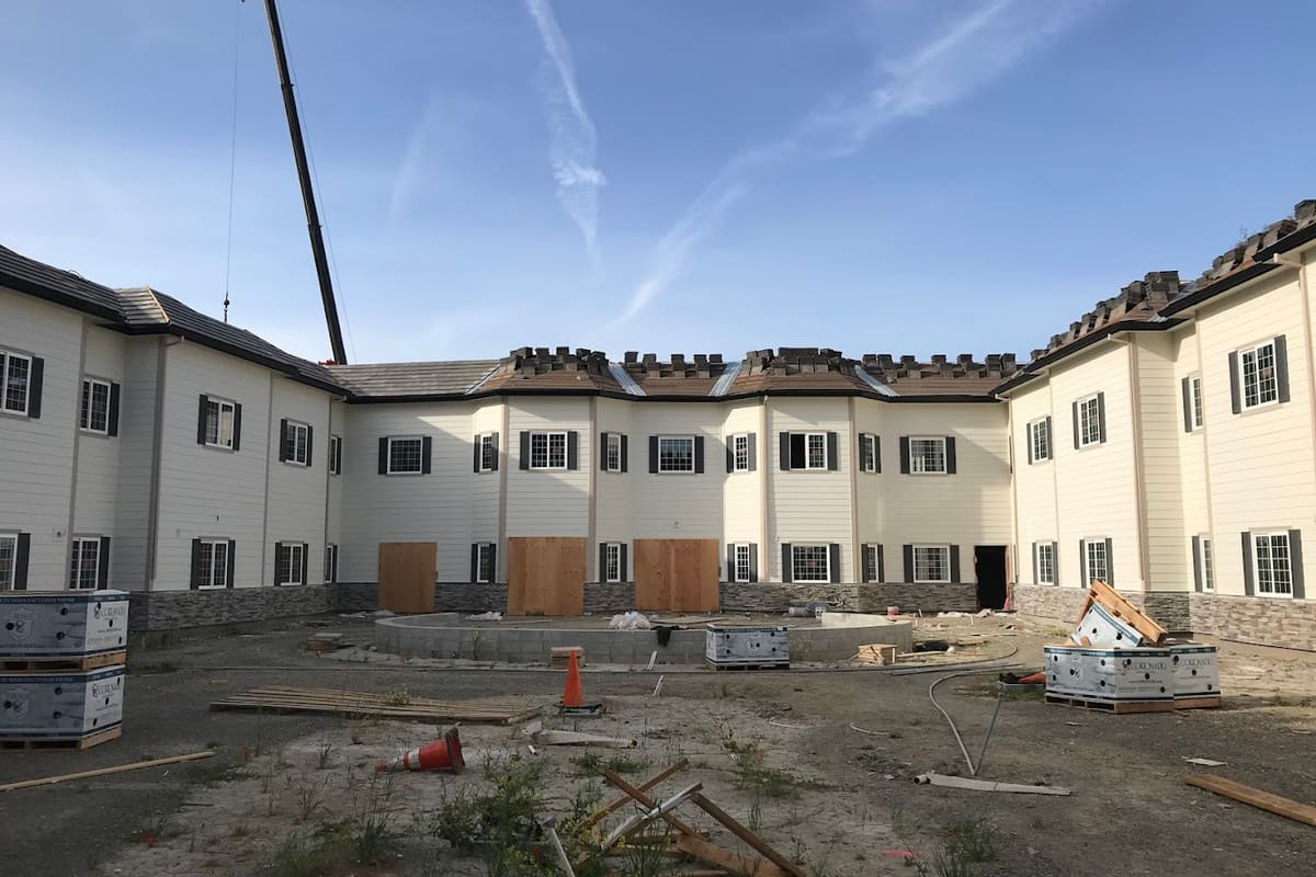Alpha Building Company Inc